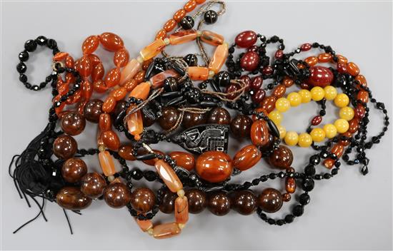 A quantity of assorted bead necklaces including agate and simulated amber etc.